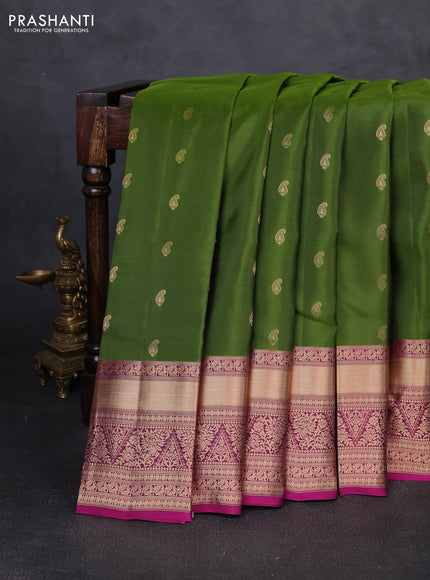 Kanchipuram silk saree mehendi green and magenta pink with allover paisley zari woven buttas and long rich zari woven border