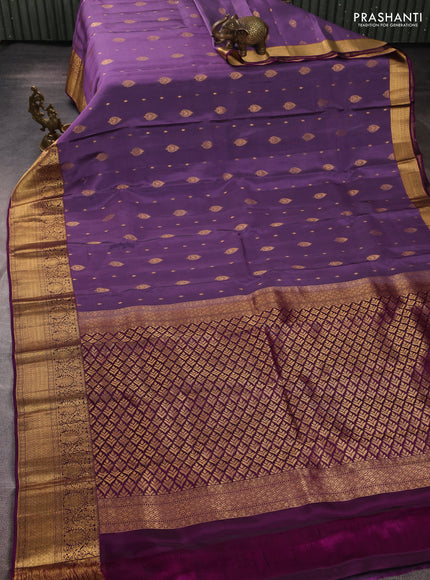 Kanchipuram silk saree pastel purple and purple with allover zari woven buttas and zari woven border