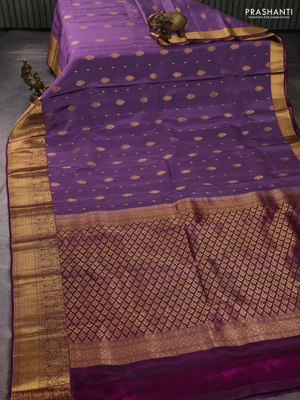 Kanchipuram silk saree pastel purple and purple with allover zari woven buttas and zari woven border