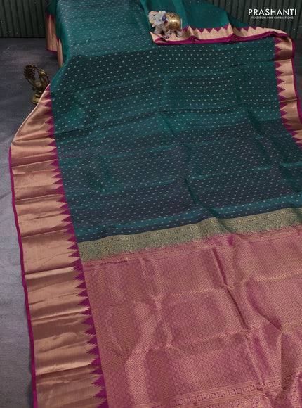 Kanchipuram silk saree green and magenta pink with allover zari woven 1000 buttas and temple design rich zari woven border