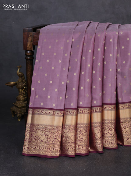 Kanchipuram silk saree rosy brown and coffee brown with allover zari woven 1000 buttas and long rich zari woven border