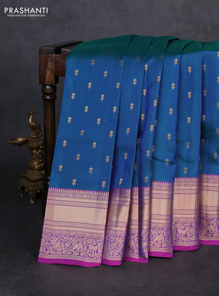 Kanchipuram silk saree peacock blue and magenta pink with allover zari woven buttas and long rich zari woven border
