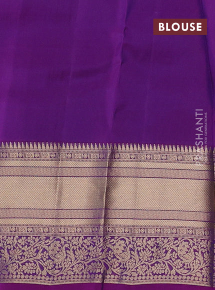 Kanchipuram silk saree peacock blue and magenta pink with allover zari woven buttas and long rich zari woven border
