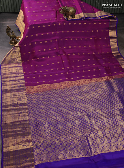 Kanchipuram silk saree magenta pink and violet with allover zari woven buttas and long rich zari woven border