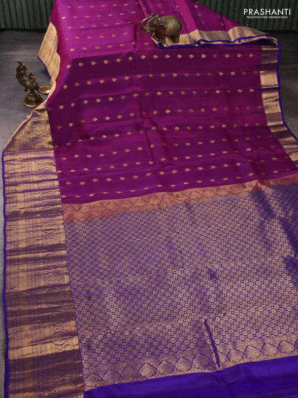Kanchipuram silk saree magenta pink and violet with allover zari woven buttas and long rich zari woven border