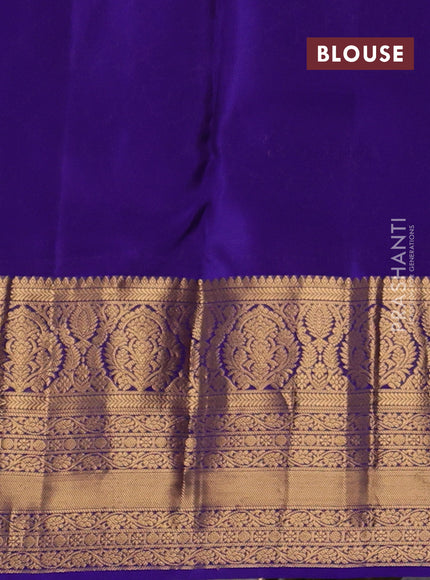 Kanchipuram silk saree magenta pink and violet with allover zari woven buttas and long rich zari woven border