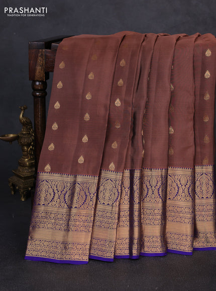 Kanchipuram silk saree brown shade and violet with allover zari woven buttas and long rich zari woven border