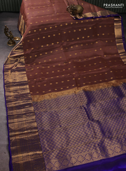 Kanchipuram silk saree brown shade and violet with allover zari woven buttas and long rich zari woven border
