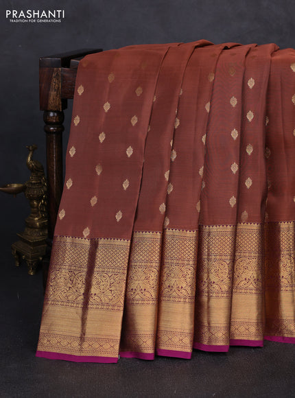Kanchipuram silk saree peach shade and magenta pink with allover zari woven buttas and long rich zari woven border