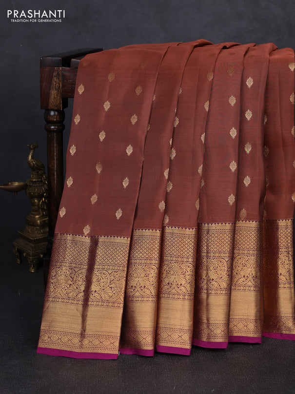 Kanchipuram silk saree peach shade and magenta pink with allover zari woven buttas and long rich zari woven border