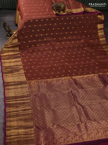 Kanchipuram silk saree peach shade and magenta pink with allover zari woven buttas and long rich zari woven border