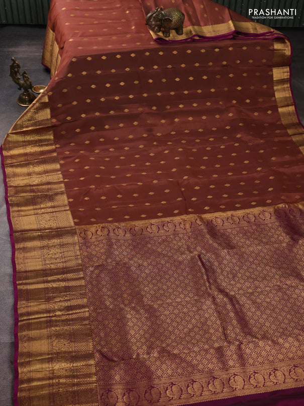Kanchipuram silk saree peach shade and magenta pink with allover zari woven buttas and long rich zari woven border