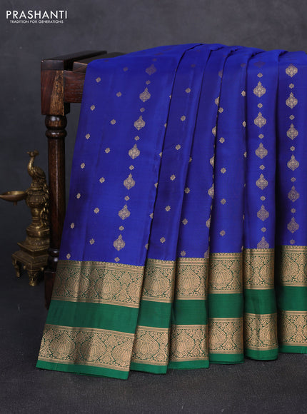 Kanchipuram silk saree blue and green with allover zari woven buttas and rettapet zari woven border