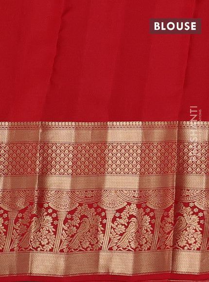 Kanchipuram silk saree orange and red with allover zari woven buttas and long zari woven border