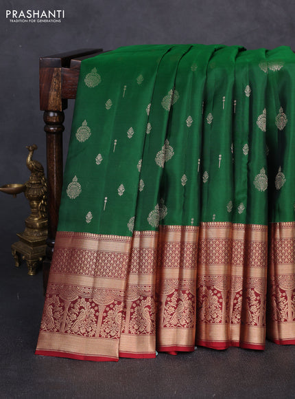 Kanchipuram silk saree green and maroon with allover zari woven buttas and long zari woven border