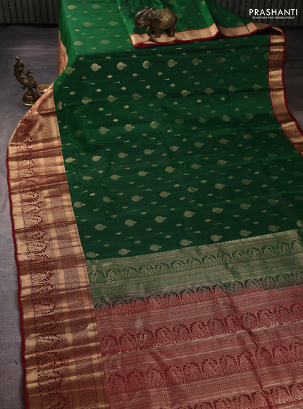 Kanchipuram silk saree green and maroon with allover zari woven buttas and long zari woven border