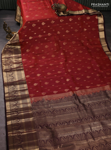 Kanchipuram silk saree rust shade and coffee brown with allover zari woven buttas and long zari woven border