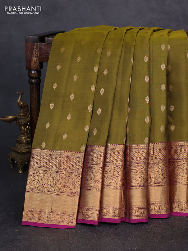 Kanchipuram silk saree mehendi green and magenta pink with allover zari woven buttas and long rich zari woven border