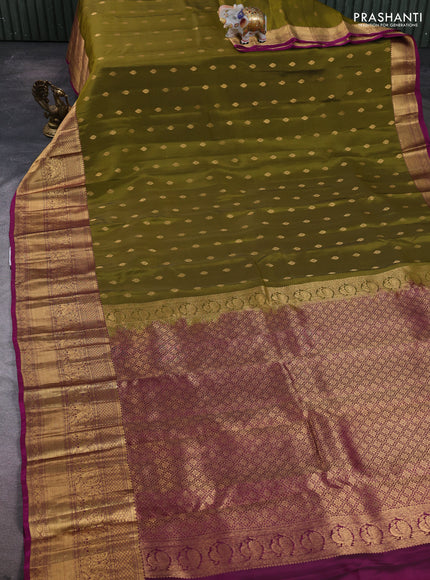 Kanchipuram silk saree mehendi green and magenta pink with allover zari woven buttas and long rich zari woven border