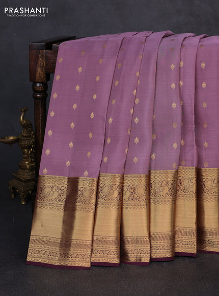 Kanchipuram silk saree mauve pink and wine shade with allover zari woven buttas and long rich zari woven border