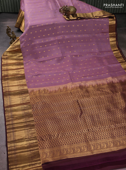 Kanchipuram silk saree mauve pink and wine shade with allover zari woven buttas and long rich zari woven border