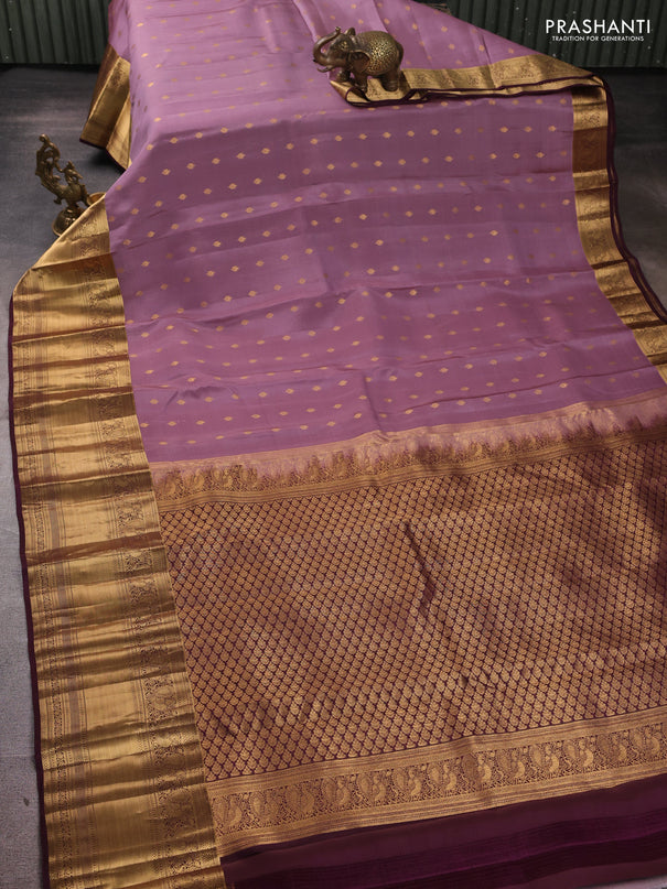 Kanchipuram silk saree mauve pink and wine shade with allover zari woven buttas and long rich zari woven border