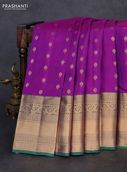 Kanchipuram silk saree magenta pink and green with allover zari woven buttas and long rich zari woven border