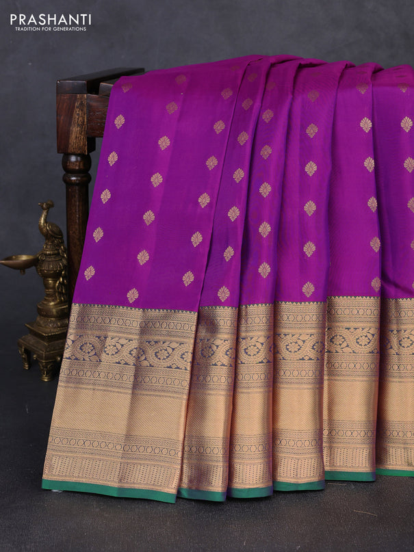 Kanchipuram silk saree magenta pink and green with allover zari woven buttas and long rich zari woven border