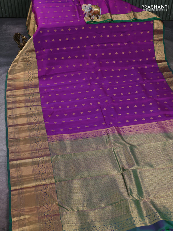 Kanchipuram silk saree magenta pink and green with allover zari woven buttas and long rich zari woven border