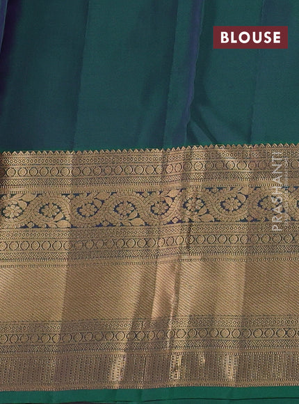 Kanchipuram silk saree magenta pink and green with allover zari woven buttas and long rich zari woven border