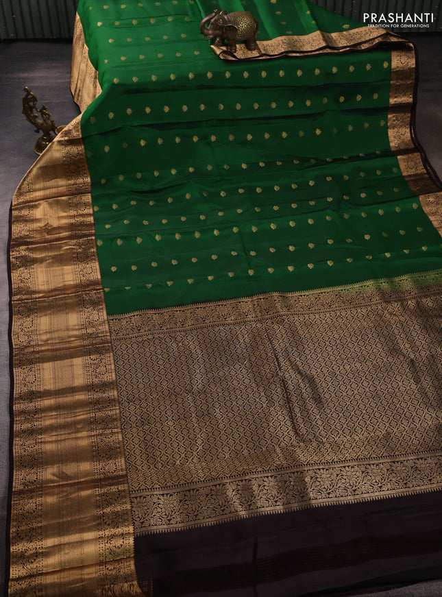Kanchipuram silk saree green and coffee brown with allover zari woven buttas and long rich zari woven border