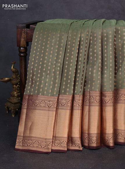 Kanchipuram silk saree pastel green and coffee brown with allover zari woven 1000 buttas and long rich zari woven border