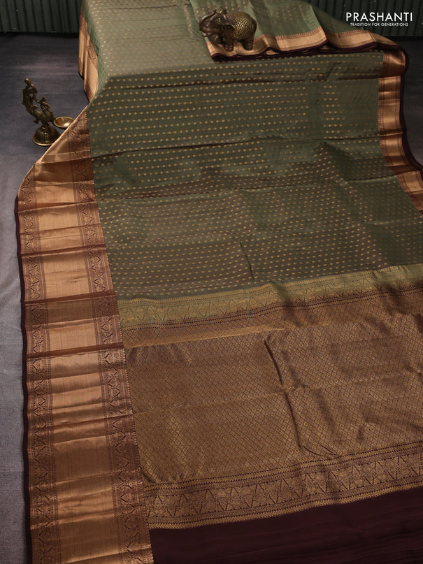 Kanchipuram silk saree pastel green and coffee brown with allover zari woven 1000 buttas and long rich zari woven border