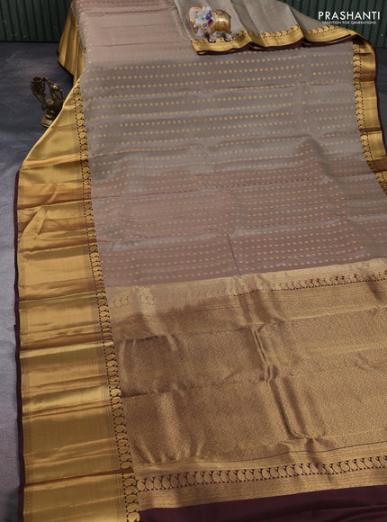 Kanchipuram silk saree sandal and coffee brown with allover zari woven 1000 buttas and long rich zari woven border