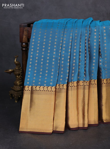 Kanchipuram silk saree pastel blue and coffee brown with allover zari woven 1000 buttas and long rich zari woven border