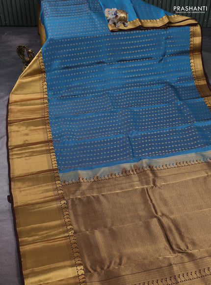 Kanchipuram silk saree pastel blue and coffee brown with allover zari woven 1000 buttas and long rich zari woven border