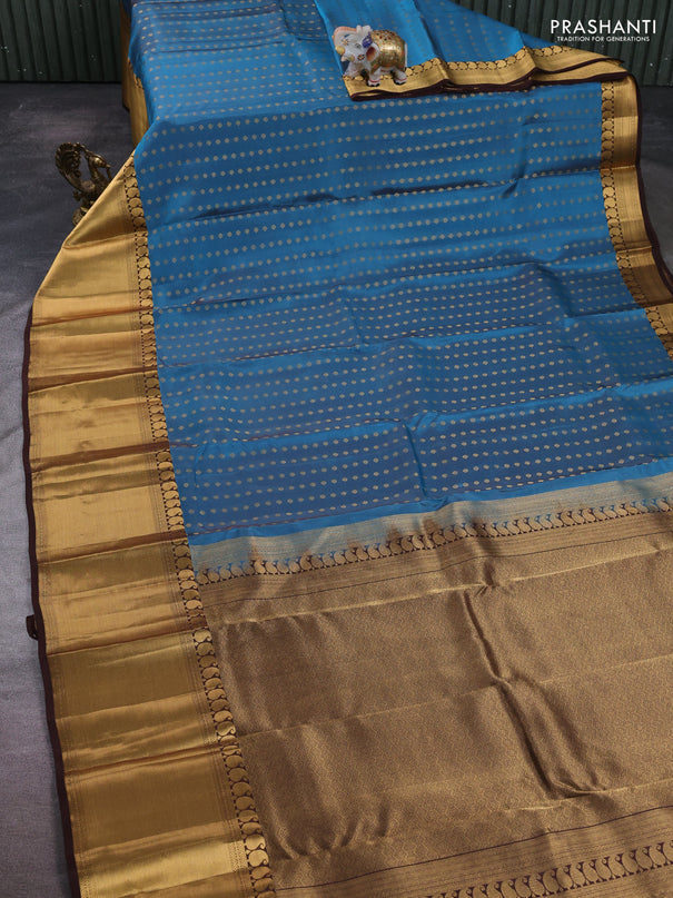 Kanchipuram silk saree pastel blue and coffee brown with allover zari woven 1000 buttas and long rich zari woven border