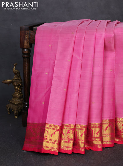 Pure kanchipuram silk saree light pink and red with allover zari woven buttas and zari woven border