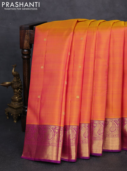 Pure kanchipuram silk saree dual shade of pinkish orange and purple with zari woven buttas and paisley zari woven border