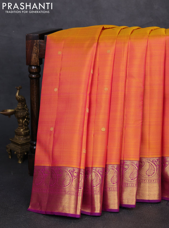 Pure kanchipuram silk saree dual shade of pinkish orange and purple with zari woven buttas and paisley zari woven border