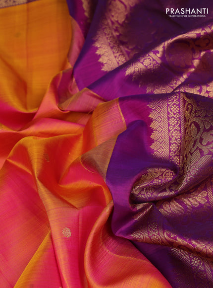 Pure kanchipuram silk saree dual shade of pinkish orange and purple with zari woven buttas and paisley zari woven border