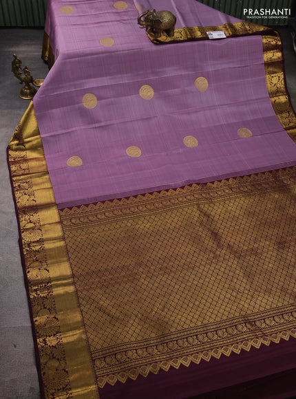 Pure kanchipuram silk saree lavender and deep wine with zari woven buttas and rich zari woven border