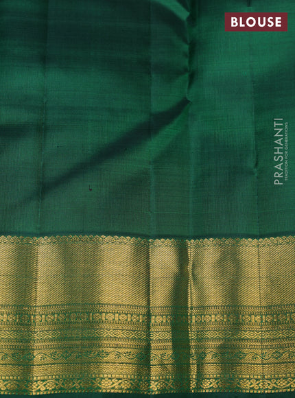 Pure kanchipuram silk saree green with allover zari woven buttas and rich zari woven border
