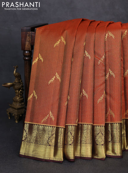 Pure kanchipuram silk saree rust shade and coffee brown with allover small zari checks & buttas and zari woven border