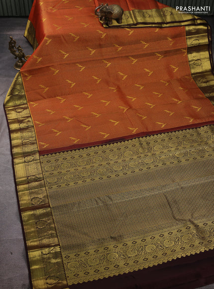 Pure kanchipuram silk saree rust shade and coffee brown with allover small zari checks & buttas and zari woven border