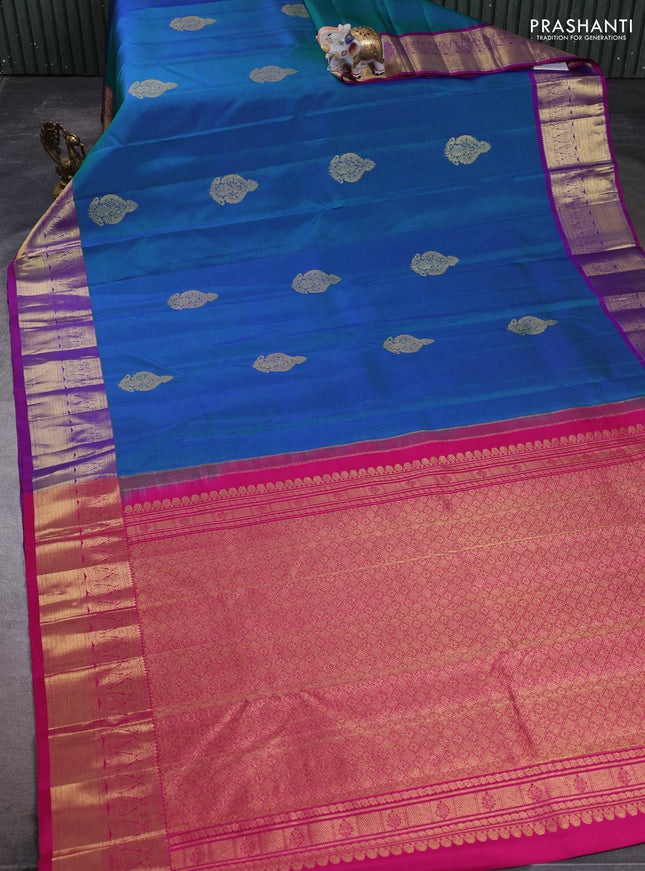 Pure kanchipuram silk saree dual shade of bluish green and pink with zari woven buttas and rich zari woven border