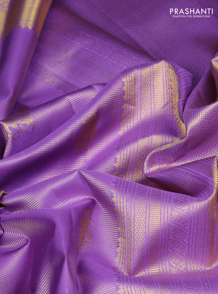 Pure kanchipuram silk saree lavender with allover brocade weaves & zari woven buttas and rich zari woven border
