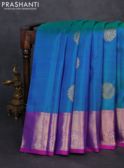 Pure kanchipuram silk saree dual shade of bluish green and pink with zari woven buttas and zari woven border