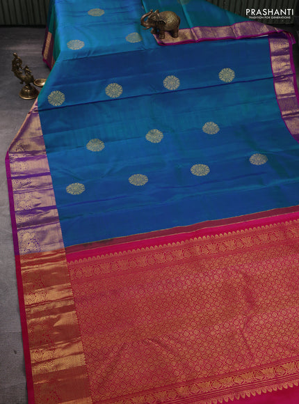 Pure kanchipuram silk saree dual shade of bluish green and pink with zari woven buttas and zari woven border