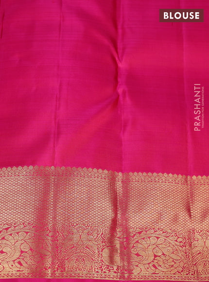 Pure kanchipuram silk saree dual shade of bluish green and pink with zari woven buttas and zari woven border